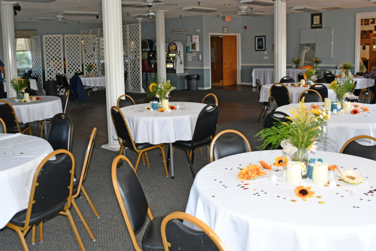 Tables with white fabric tablecloths